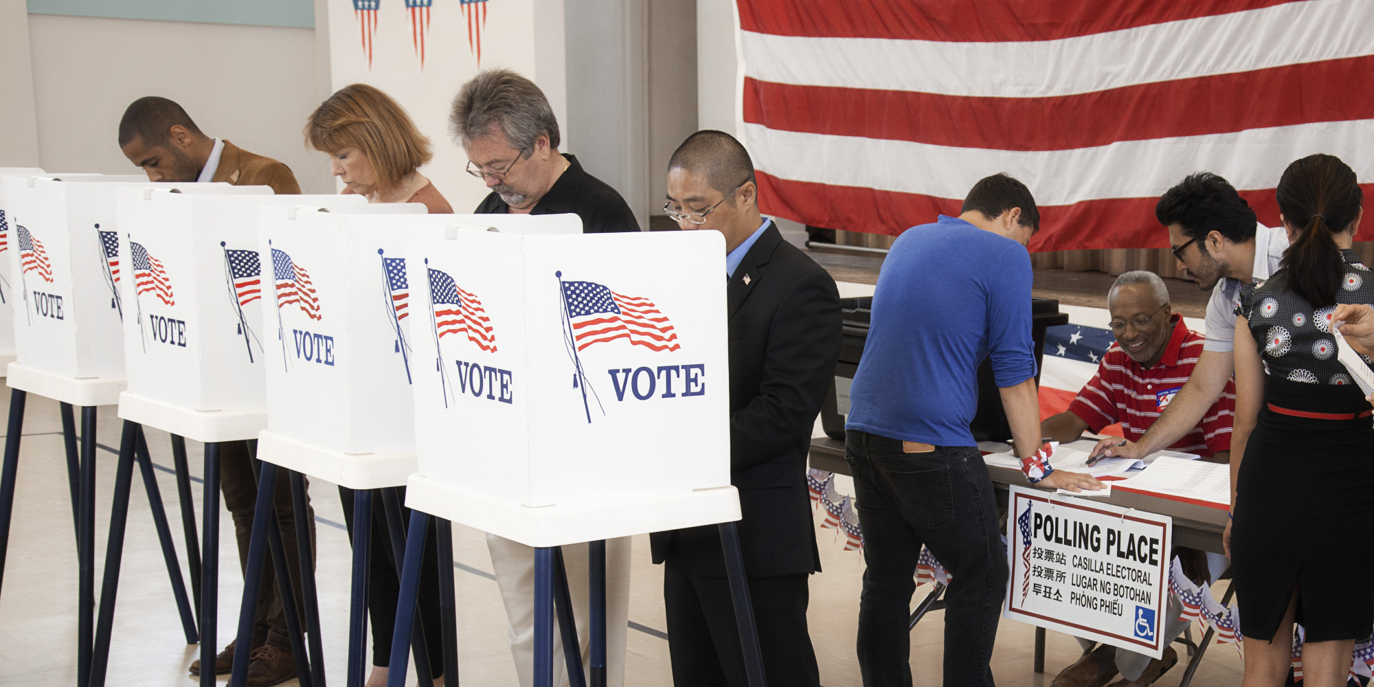 people voting at voting booth